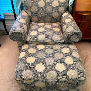2 nice chairs with otterman and pillows.